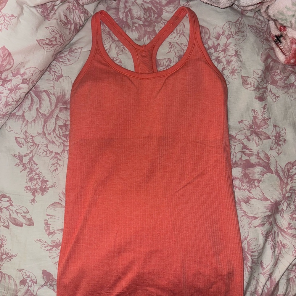 Ebb to street lululemon top in a coral color, size 8!